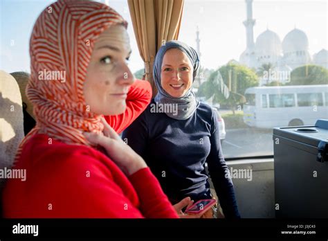 United Arab Emirates Women In Headscarves In Abu Dhabi Stock Photo