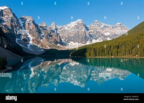 „moraine Lake Reflects The „wenkchemna Peaks Valley Of The Ten Peaks