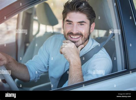 Portrait Of Smiling Man Driving Car Stock Photo Alamy