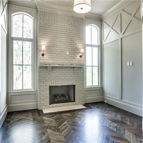 How to change the look of floor to ceiling brick? brick fireplace and herringbone flooring | Home, House