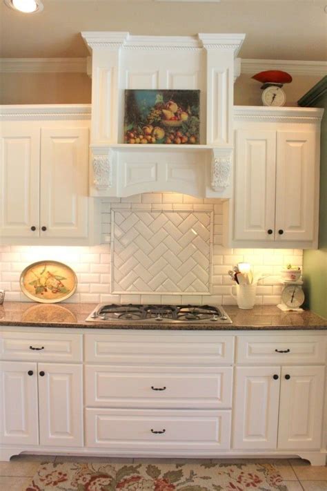 Biscuit kitchen / elephant ear pinstripe glaze this spacious kitchen had excellent quality cabinets, but the darkness of the stain really made the kitchen feel dark and drab. Interesting-biscuit-subway-tile-backsplash-and-copper ...