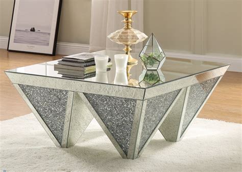 The best way to tie your room together is with a stylish coffee table. Noralie Coffee Table 84900 in Mirror & Faux Crystals by Acme