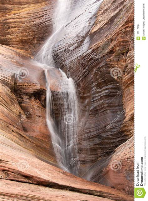 A Temporary Waterfall Over Red Sandstone Cliff Caused By Rain In Zion