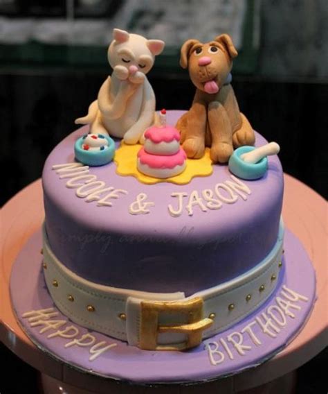 Choose from a variety of delicious birthday cakes and lovely flower arrangements. Dog and Cat theme birthday cake for twins.JPG