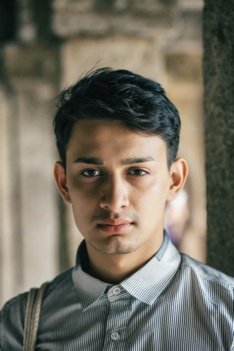 Outdoor Headshot Of Young Fashionable Indian Man By Stocksy