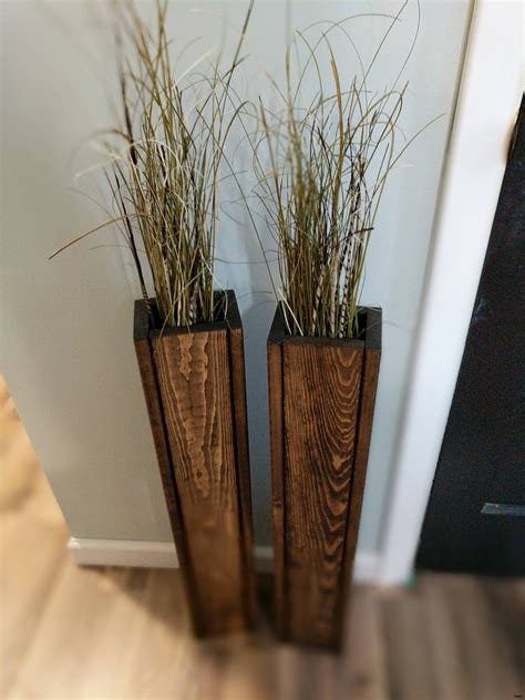 Decorate your mantle with greenery, then add ribbons and ornaments for a pop of color. 11 Nice Large Floor Vase with Sticks | Decorative vase Ideas