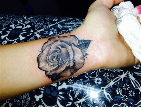 Rose is an eternal tattoo theme because of its beauty and symbolism. 32 Fantastic Flowers Tattoos On Wrists