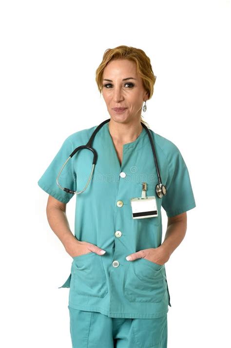 Beautiful And Happy Woman Md Emergency Doctor Or Nurse Posing Smiling
