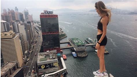 Rooftop Selfies Russian Model Poses On Top Of Some Of The Tallest Structures In Hong Kong And