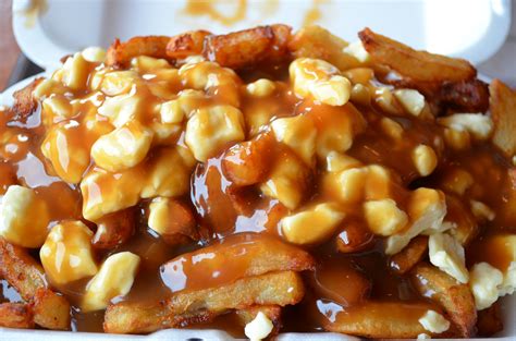 Poutine French Fries Topped With A Gravy Sauce And Cheese Curds Quebec Canada Canadian