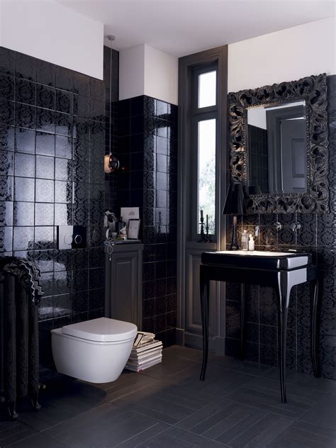 The Sleek Detailed Black Tile Walls Make For A Powder Room That Is