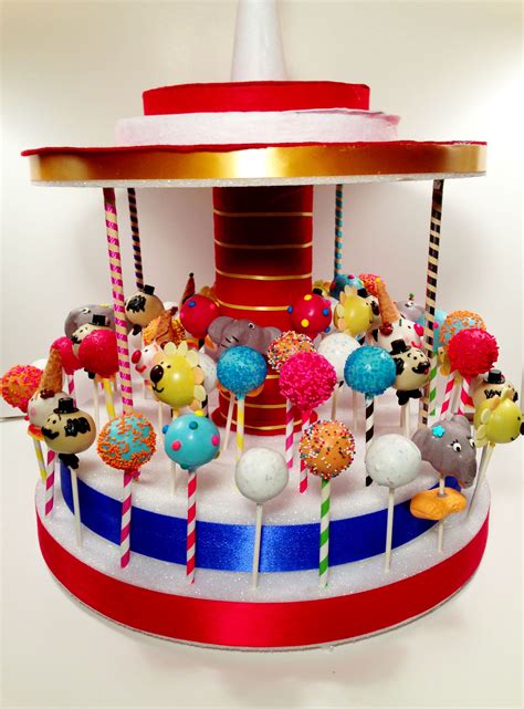 This cake topper set is terrible 2 figurines are ok but the penguins are a ring not a figurine and the circus backdrop a flimsy piece of plastic poorly painted. Circus is in town! Cake pops By blakers dozen in 2019 ...