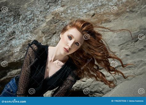 Beautiful Woman With Long Red Hair Posing In Nature Beautiful Natural