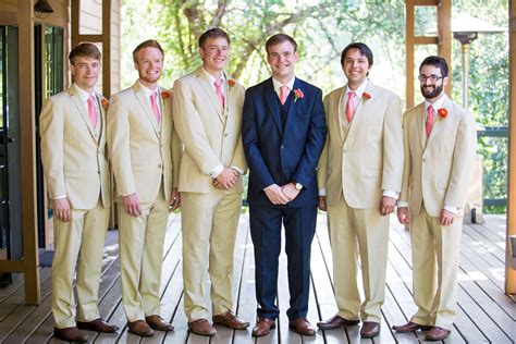 Navy Grooms Suit With Ivory Groomsmen Suits