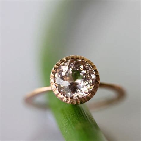 This opal is a firecracker of color. 27 Non-Diamond Engagement Rings that Sparkle Just as Bright | OneWed