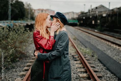 Beautiful Lesbian Couple Shoot On An Abandoned Railway Stock Photo