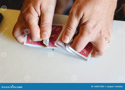 Magician Hands Doing Magic Trick With Playing Cards Stock Photo Image