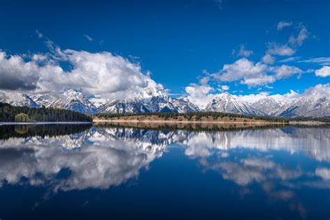 Mountains And Clouds Reflecting On Jackson Lake Grand Tet Flickr