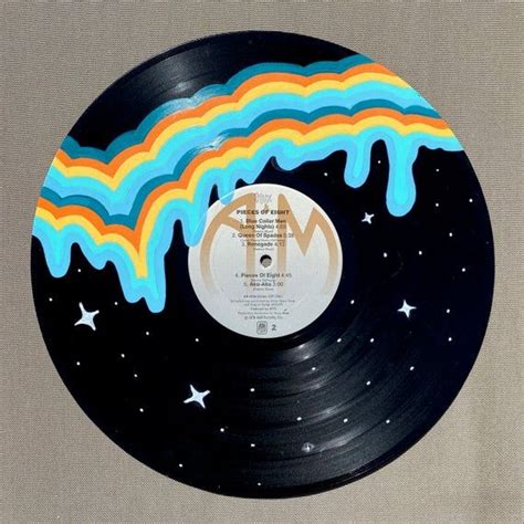You can use this simple technique to make a lot of unique and creative decorations. Drippy Drip Painted Record - Hand painted vinyl records ...