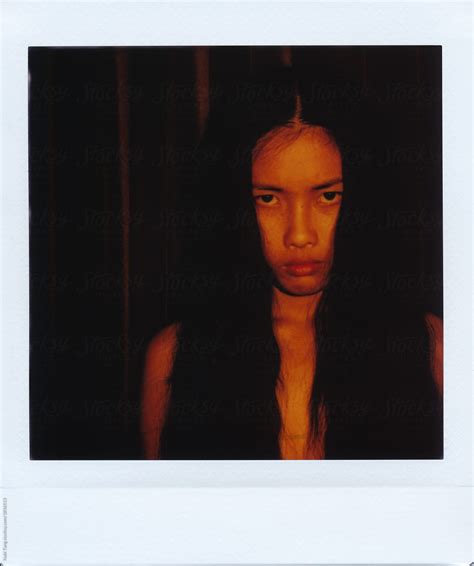 Instant Square Polaroid Portrait Photograph Of Young Asian Woman