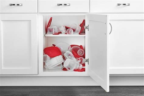 Whether you decide to keep lids on or separated, make sure to bundle like items together. Adjustable Pull-Out Cabinet Drawer For Organizing Your ...