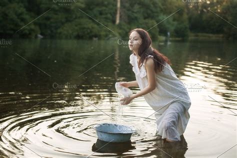 Woman Washing Clothes In The River Washing Clothes Laundress Nighty