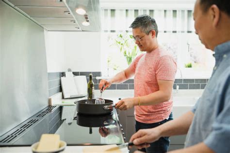 Chinese Man Cooking Stock Photos Pictures And Royalty Free Images Istock