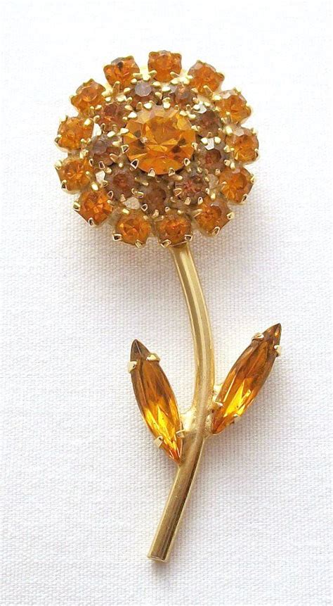 Most wedding ceremonies involve an exchange of marriage vows by a couple, presentation of a gift. Vintage Amber Gemstone And Gold Flower Brooch Wedding ...
