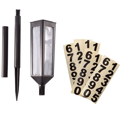 Holds up to 5 address numbers on each side of the sign. Solar Address Light - Solar Powered Address Sign - Walter Drake