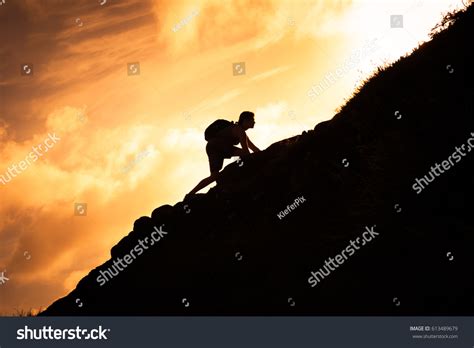 Man Climbing Mountain Stock Photo 613489679 Shutterstock