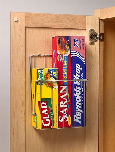 Put six rolls of plastic wrap, foil, plastic bags, and waxed paper at your fingertips. Mounted Kitchen Wrap Organizer - Chrome in Food Wrap Holders
