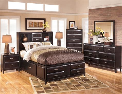 Whether you're drawn to sleek modern design or distressed rustic textures, ashley homestore combines the latest trends with comfort and quality at a price that won't break the bank. Kira Storage Platform Bedroom Set from Ashley (B473-64-65 ...