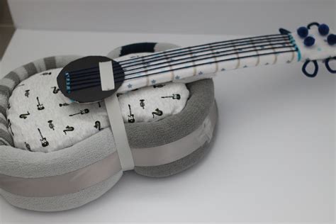 Diaper Guitar, unique baby gifts www.RsBabybaskets.Etsy.com | Unique baby gifts, Unique baby ...