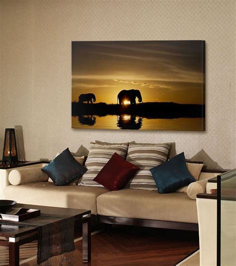 Hand scraped wood flooring, thatched roofs, reclaimed barn wood, hand made rustic. African Elephant Sunset | African themed living room ...