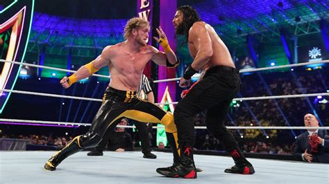 Logan Paul Hits Roman Reigns With One Lucky Punch Wwe Crown Jewel