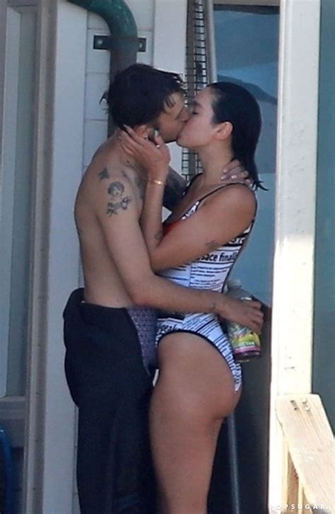 Pop singer dua lipa and model anwar hadid, younger brother to bella and gigi, sparked serious romance rumors over the fourth of july weekend. Dua Lipa Wears Versace Swimsuit With Anwar Hadid ...