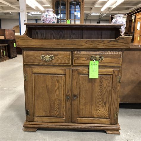 Below this cabinet is an open shelf to put fresh bath towels and extra toiletries. Vintage Oak Dry Sink