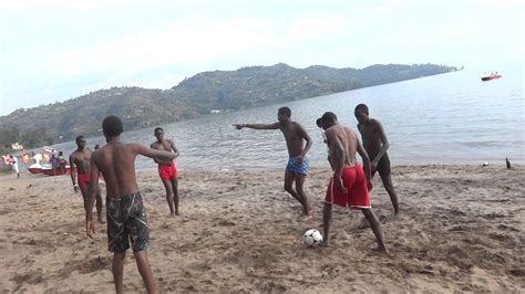 Lake kivu empties into the ruzizi river, which flows southwards into lake tanganyika. Nyaripunda brothers on Tam Tam beach playing football # ...