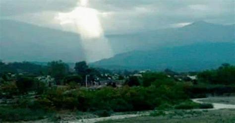 Image Of Jesus Christ ‘spotted Shining Through The Clouds In Photo
