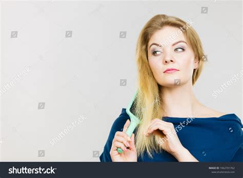 Woman Combing Her Hair Brush Young Stock Photo 1062701762 Shutterstock