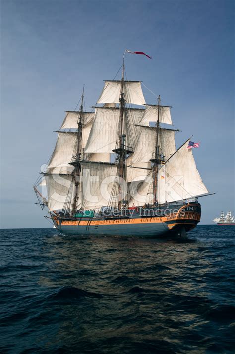 Pirate Ship Sailing At Sea Under Full Sail Stock Photos