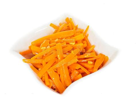 To finely julienne a carrot for more elegant preparations. Julienne Carrots In White Bowl Stock Photo - Image of carrots, fork: 40294296