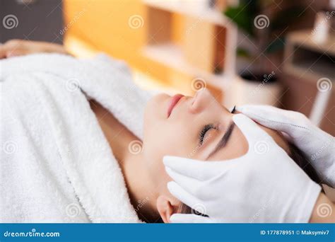 Pretty Woman Receiving A Relaxing Massage At The Spa Salon Stock Image