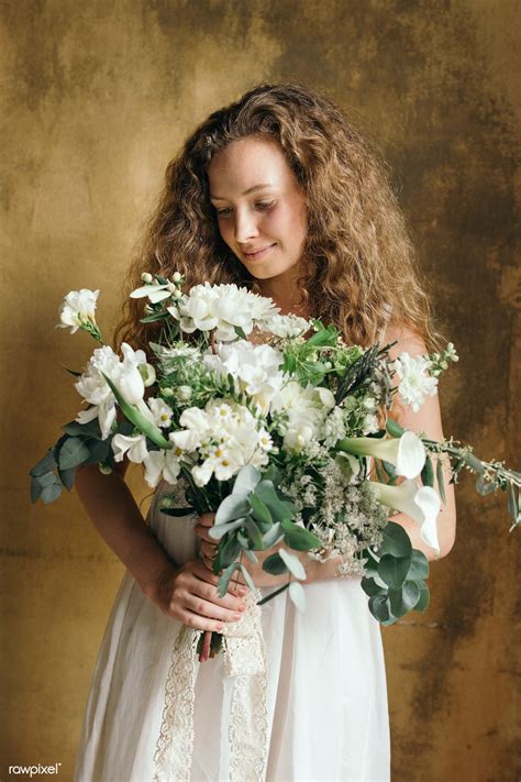 Download Premium Image Of Woman Holding A Bouquet Of White Flowers 1209185 Female Images