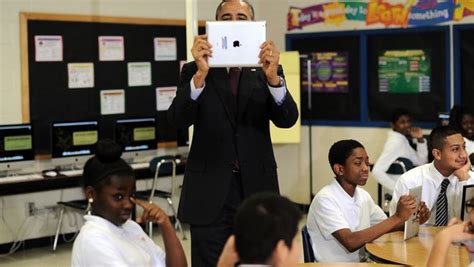 President Obama Records Video With An Ipad As He Visits A Classroom At
