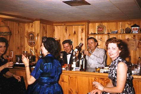 Mom And Dad Parties In The 50s Belly Up To The Old Home Bar