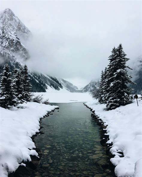 River Through The Snowy Canadian Mountains In 2020 Travel Images