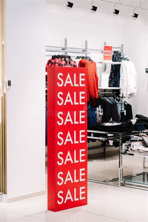Signs In A Clothing Store With Discount Inscription Sale Stock Photo