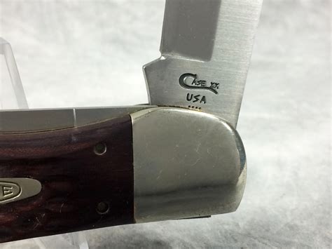 How much is 1996 CASE XX USA 6265 SAB SS Serrated Pakkawood Folding