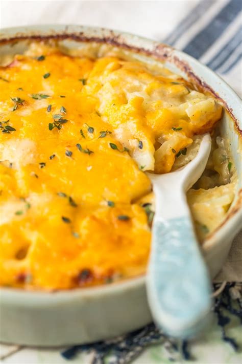 Arrange potatoes in greased 2 quart casserole in 3 layers, topping each layer with part of the chopped onions and 1/3 of the sauce. Easy Cheesy Scalloped Potatoes Recipe - The Cookie Rookie ...